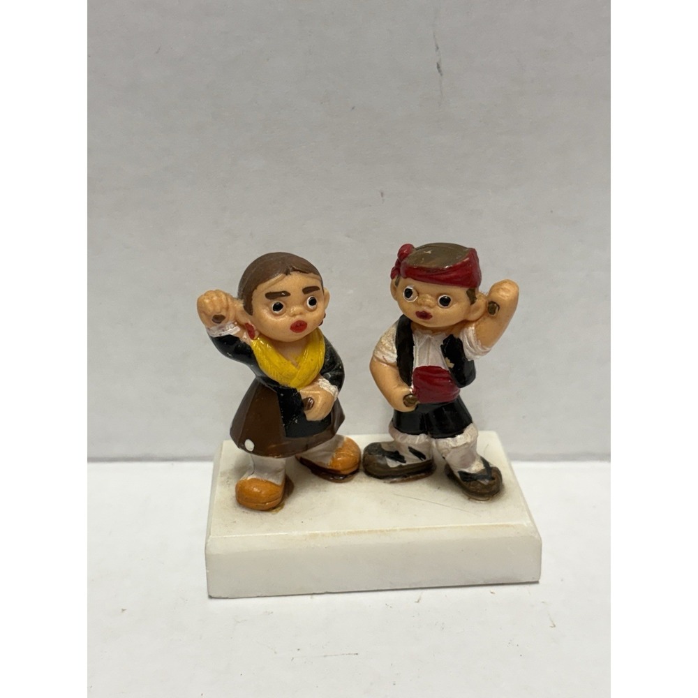Spanish Mud People Hand Painted Figurines Terra Cotta Pottery on a pedestal
